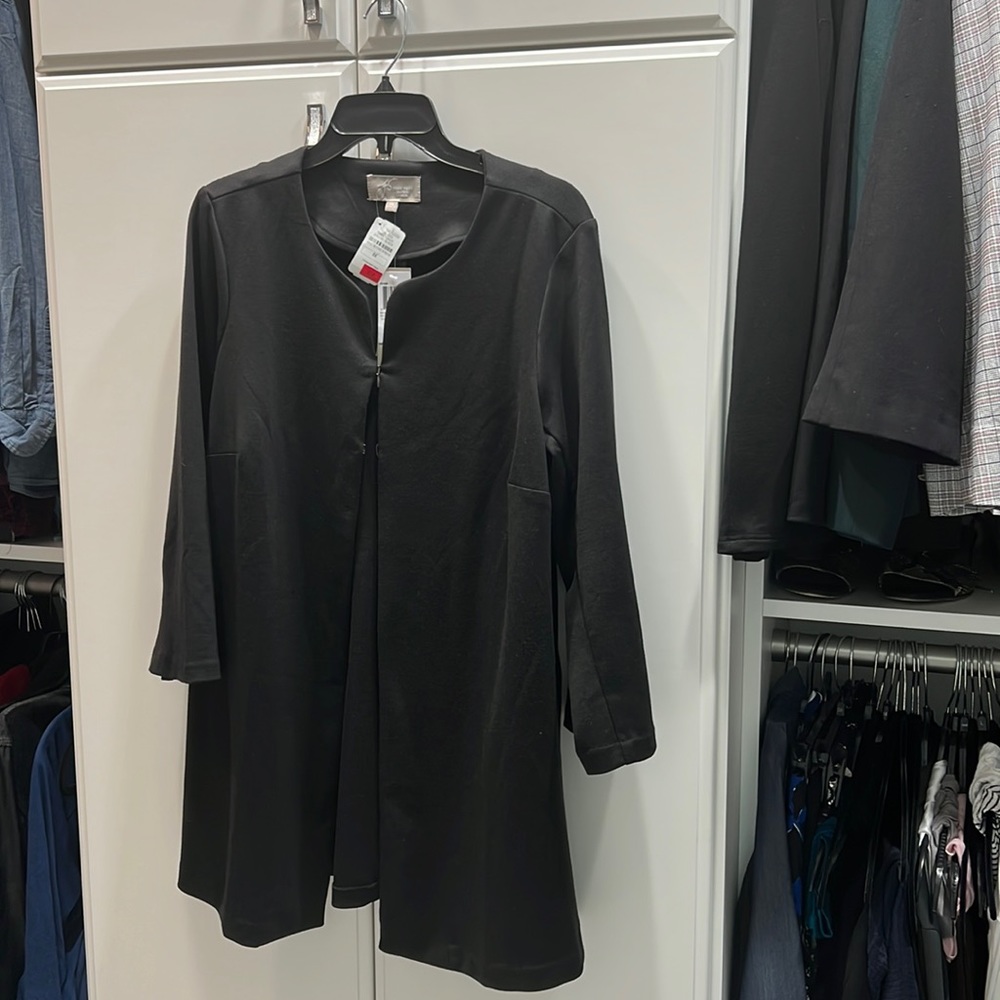 Blk Joan Vass jacket 3/4 sleeves w top closure comfortable material.  Covers but